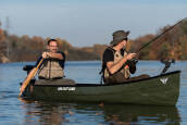 novacraft lure 15.7 fishing canoe being paddled