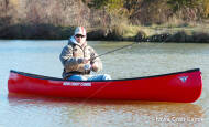 Nova Craft Trapper 12 - Red, being used as a fishing canoe. Stable and manouverable this little canoe is ideal for casting and moving around on