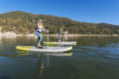 The Hobie iEclipse being used on a calm lake